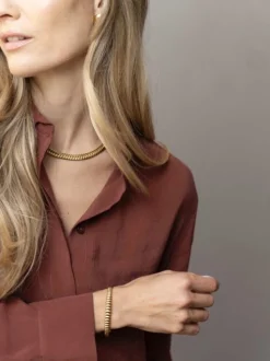 EB – vergulde bangle met geribbeld patroon