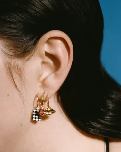 Wouters&Hendrix – trompe l’oeil oorringen met lip, mozaïek en granaat