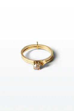 Lore Van Keer – dubbele 18K gouden ringen met witte diamant en cubic add on