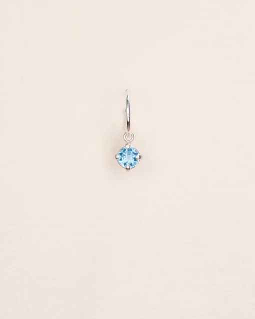 Wouters&Hendrix – single hoop met blauwe topaas